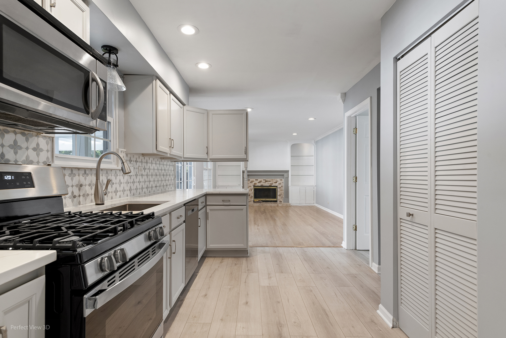 3290 Johnsbury Court Aurora, IL 60504 - Photo 8 of 31 a kitchen with a stove and a refrigerator