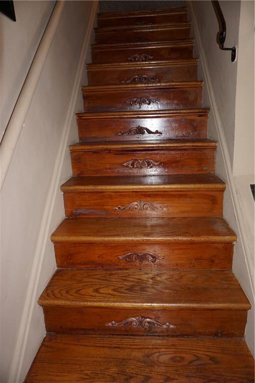 924 Roland Road Pittsburgh, PA 15221 - Photo 8 of 23 Special touches on hardwood steps to the 2nd floor.