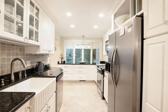 a room with furniture and a window