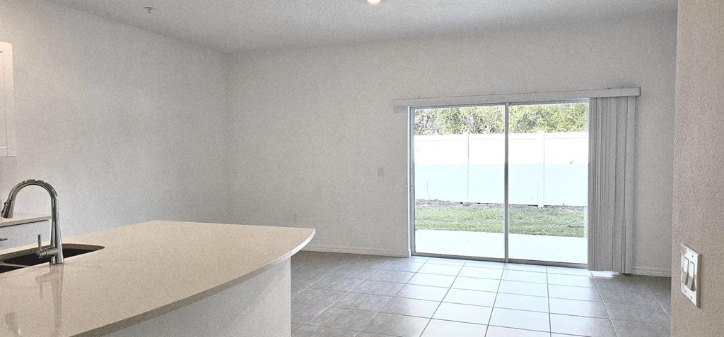 5000 Revolutionary Way St. Cloud, FL 34769 - Photo 12 of 32 a view of a room that has a window in it