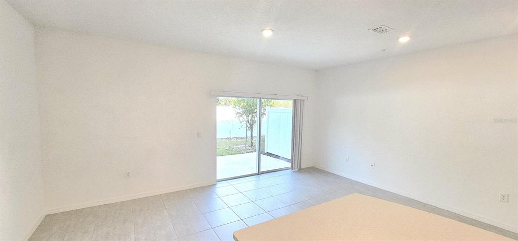 5000 Revolutionary Way St. Cloud, FL 34769 - Photo 13 of 32 an empty room with windows