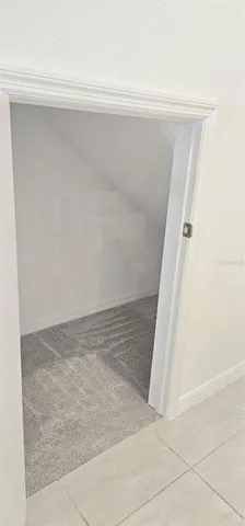 a view of a bathtub in hallway