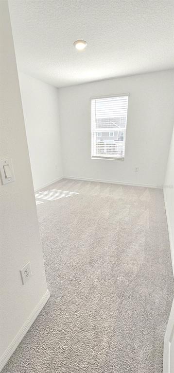 5000 Revolutionary Way St. Cloud, FL 34769 - Photo 28 of 32 an empty room with a window