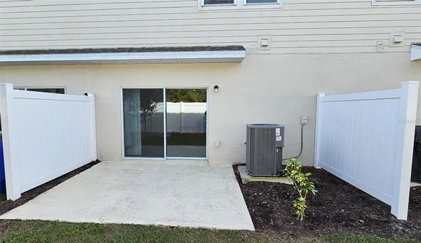 a view of a back yard of the house