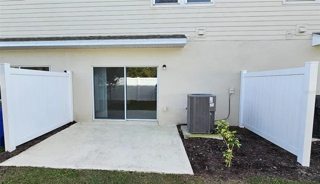 a view of a back yard of the house