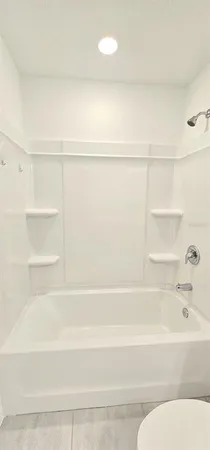 a bathroom with a bathtub