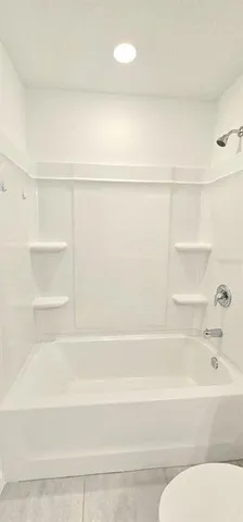 a bathroom with a bathtub