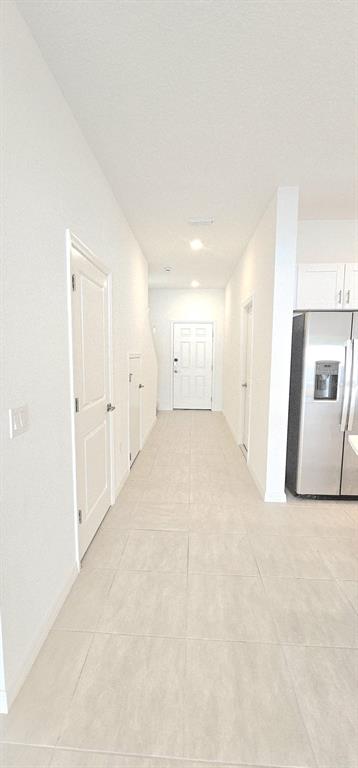 5000 Revolutionary Way St. Cloud, FL 34769 - Photo 6 of 32 a view of a livingroom with a kitchen