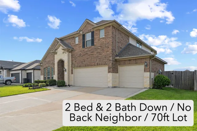 a front view of building with yard