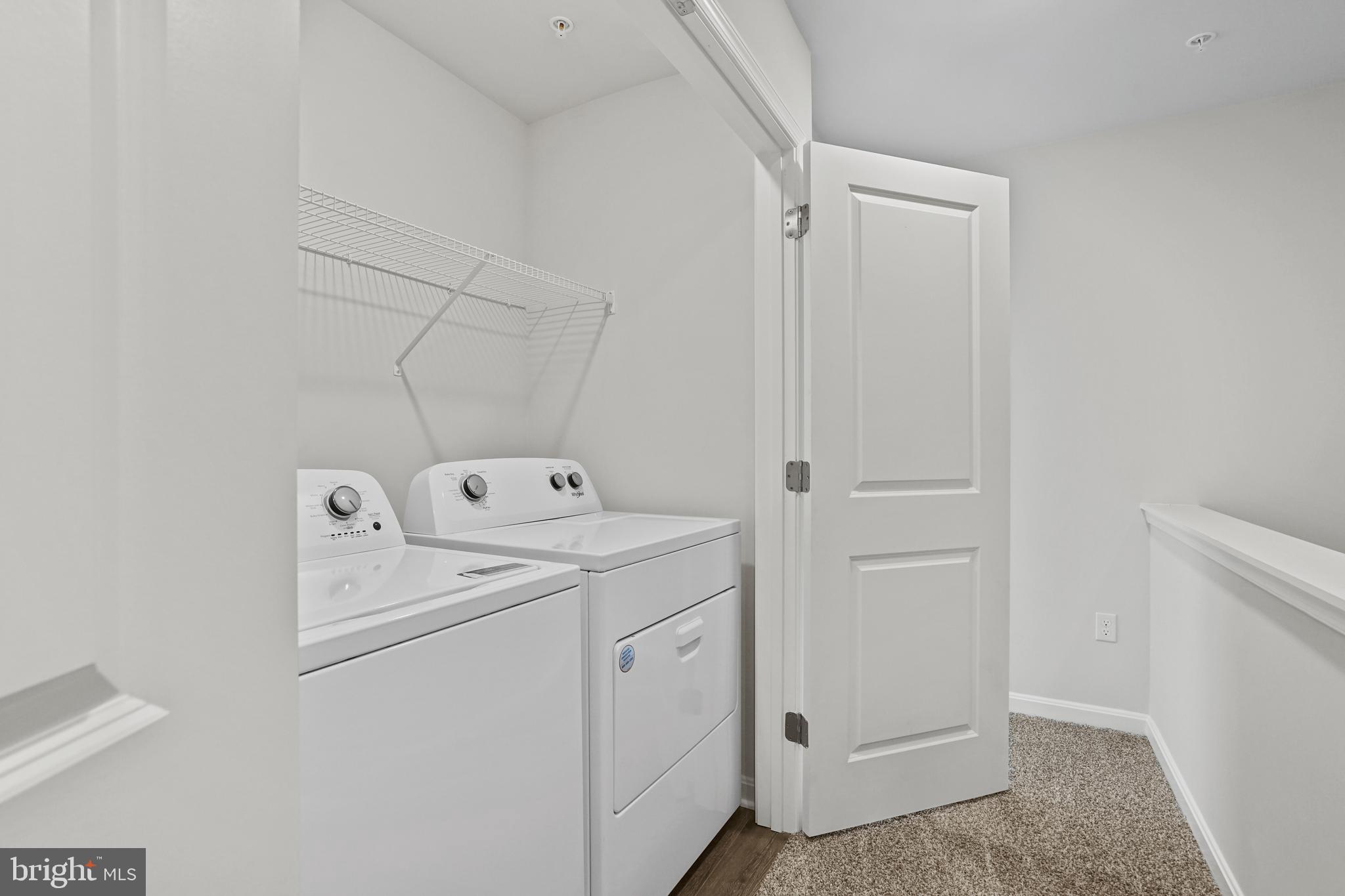 8709 Tavern Street Clinton, MD 20735 - Photo 8 of 25 a utility room with dryer and washer