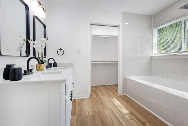 a bathroom with a toilet sink and a bathtub