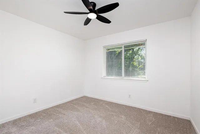 a view of swimming pool with outdoor seating and lake view