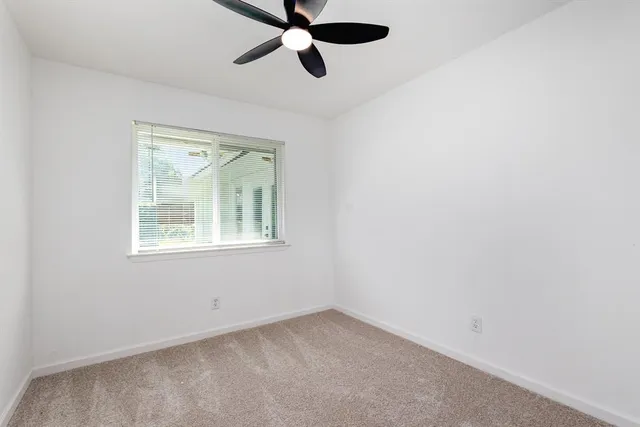 a view of a house with back yard