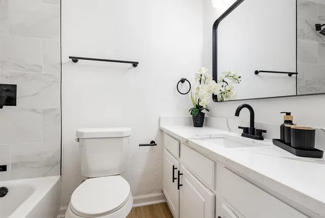 a view of swimming pool with seating space