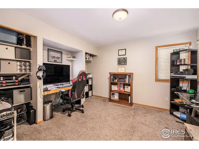 a view of a workspace with furniture
