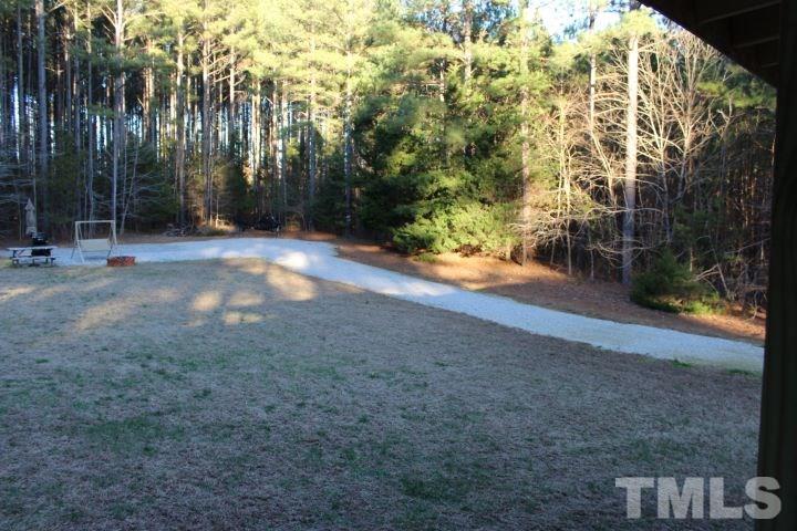 141 Waters Edge Road Henderson, NC 27537 - Photo 23 of 30 a view of backyard with green space