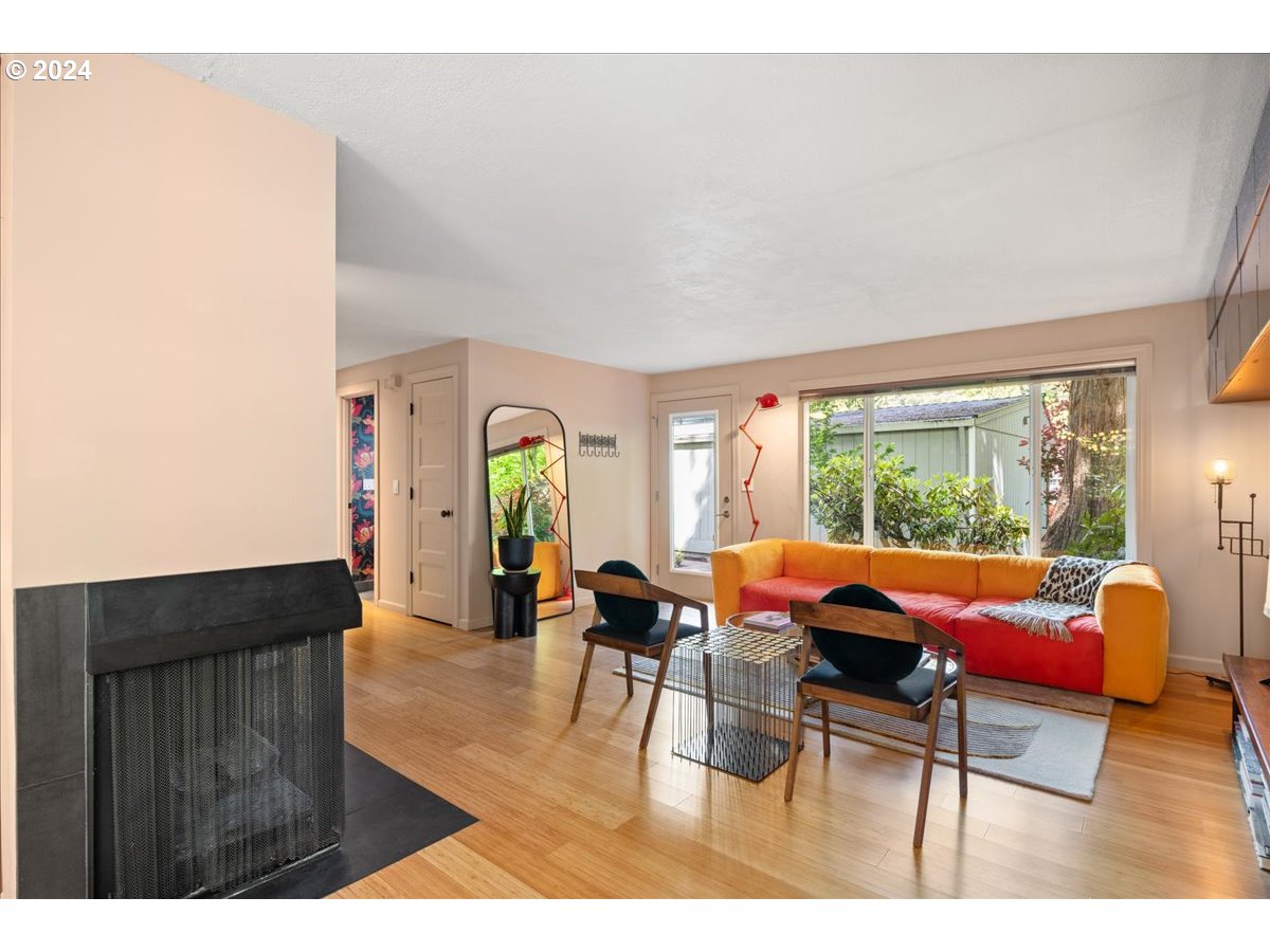 4432 Northwest Barnes Road Portland, OR 97210 - Photo 15 of 36 a living room with furniture and a large window