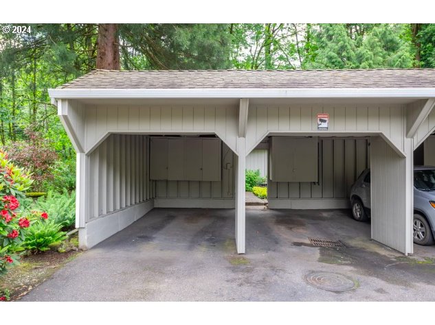 4432 Northwest Barnes Road Portland, OR 97210 - Photo 30 of 36 a front view of a house with a garage