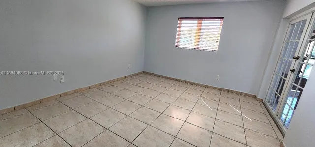 a bathroom with a sink toilet and mirror