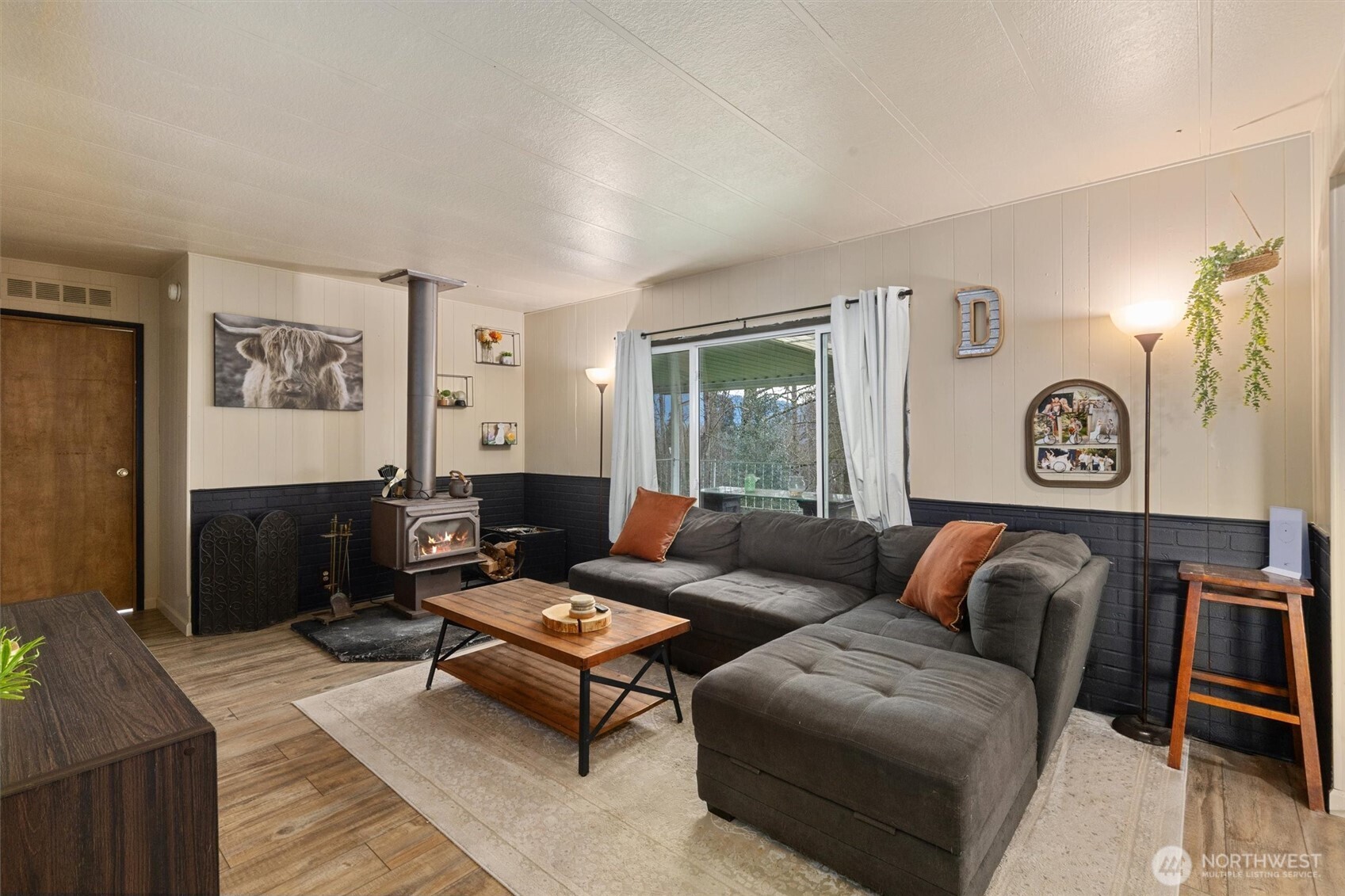 14601 Jim Creek Road Arlington, WA 98223 - Photo 13 of 35 a living room with furniture and a window