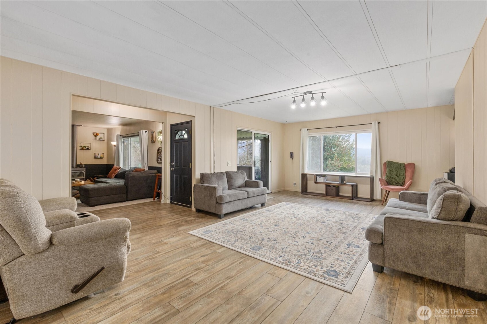 14601 Jim Creek Road Arlington, WA 98223 - Photo 5 of 35 a living room with furniture and a large window