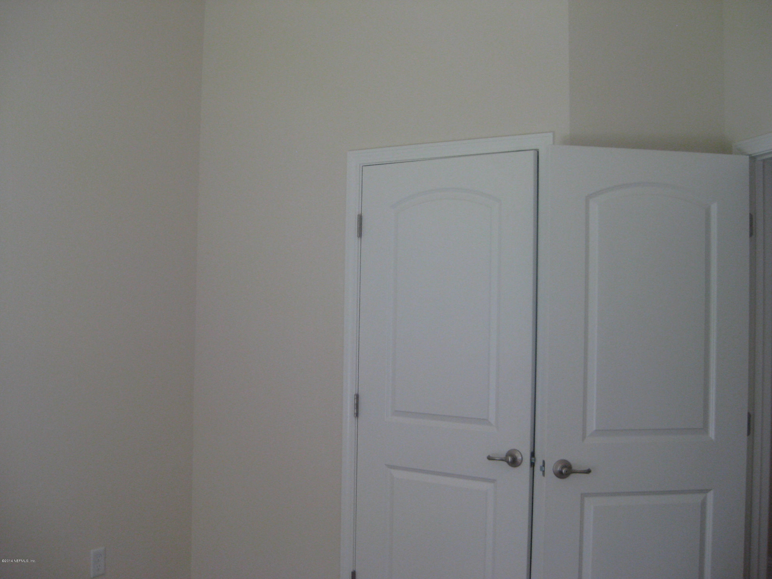 5908 Round Table Road Jacksonville, FL 32254 - Photo 12 of 23 paneled double closet doors