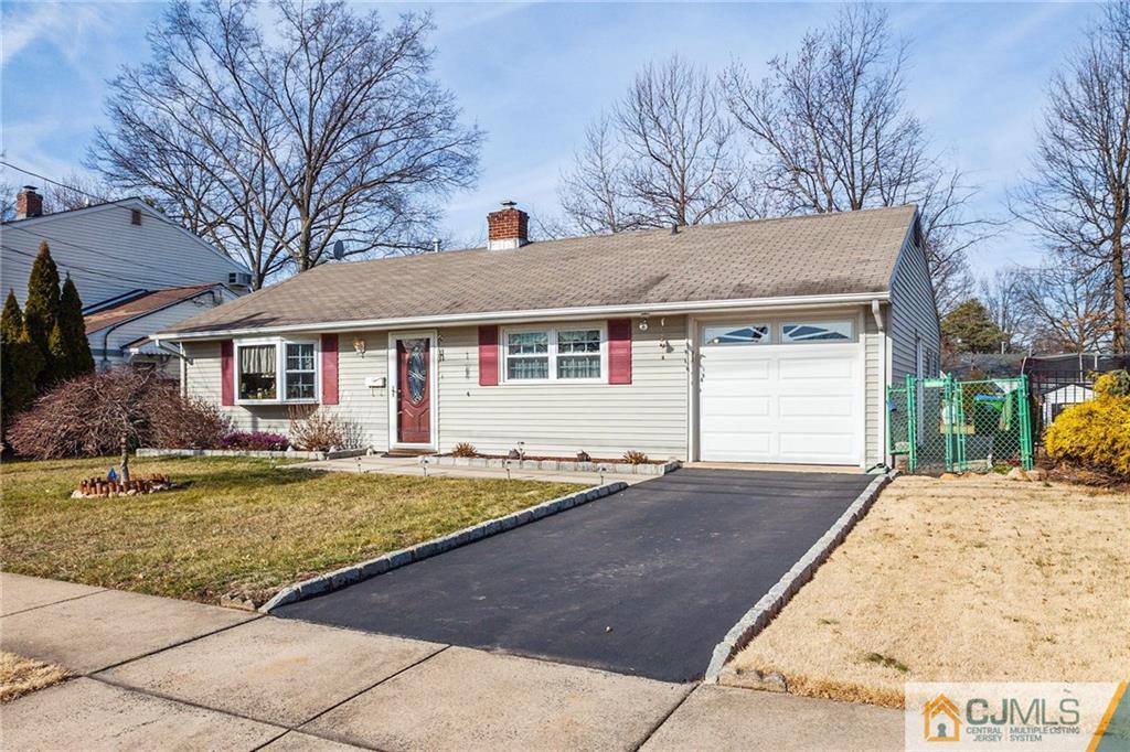 156 Winthrop Road Edison, NJ 08817 - Photo 11 of 28 a front view of a house with a yard