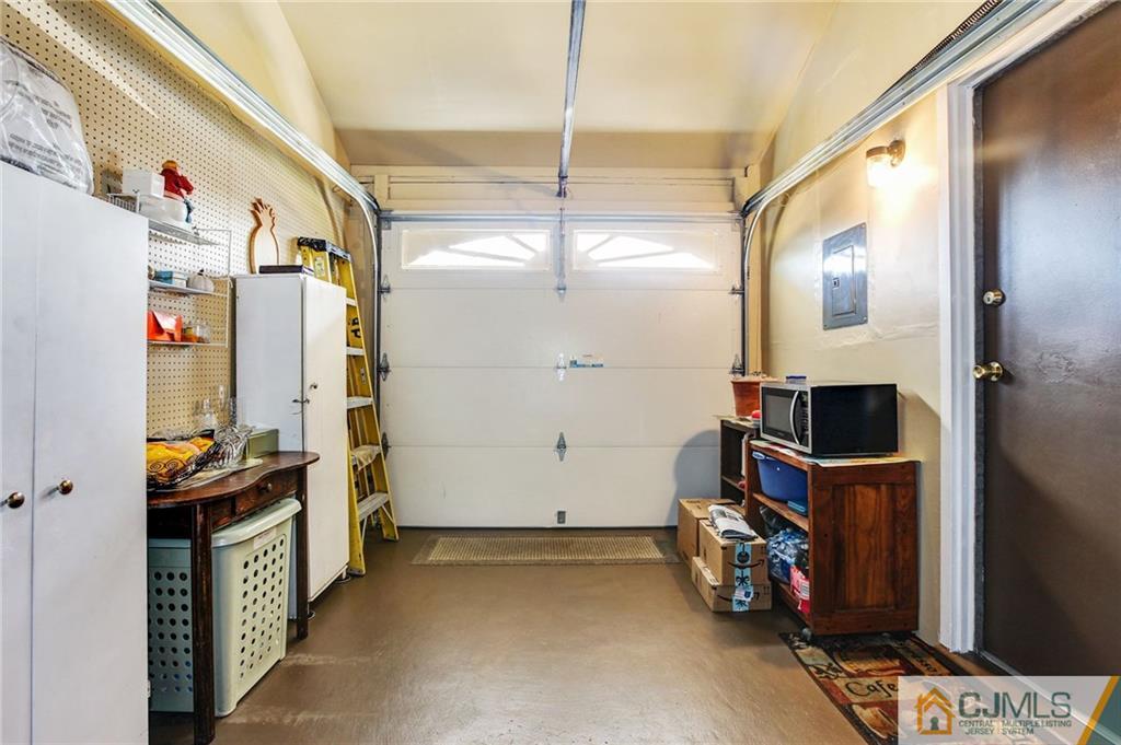 156 Winthrop Road Edison, NJ 08817 - Photo 26 of 28 a view of walk in closet with clothes and shoes