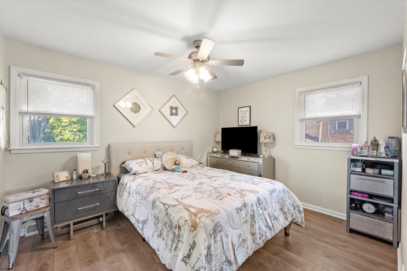 7749 South Octavia Avenue Bridgeview, IL 60455 - Photo 17 of 35 a bedroom with a bed and wooden floor