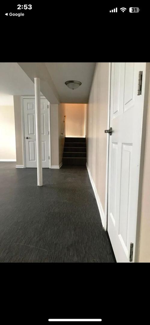 7749 South Octavia Avenue Bridgeview, IL 60455 - Photo 21 of 35 a view of empty room with wooden floor