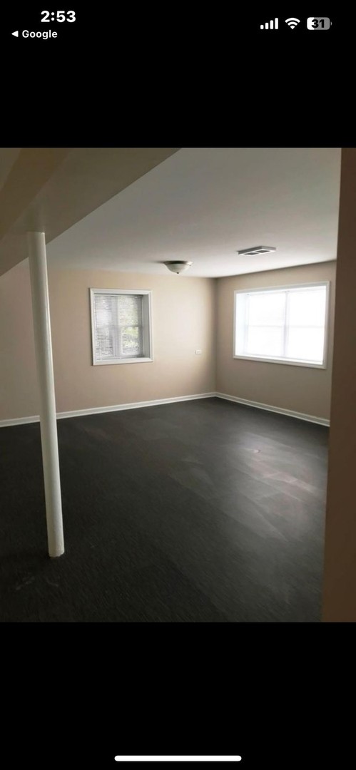 7749 South Octavia Avenue Bridgeview, IL 60455 - Photo 23 of 35 a view of an empty room and window
