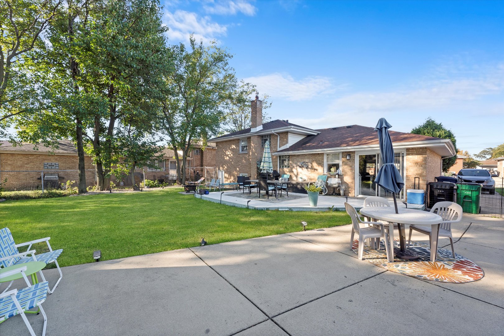 7749 South Octavia Avenue Bridgeview, IL 60455 - Photo 26 of 35 a view of a house with a yard porch and sitting area