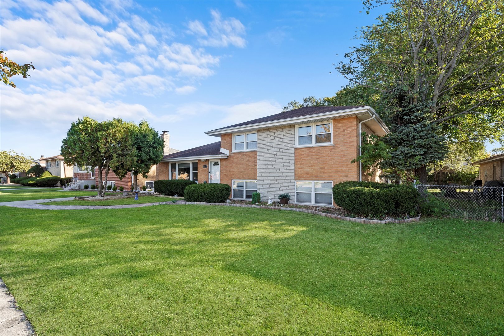 7749 South Octavia Avenue Bridgeview, IL 60455 - Photo 3 of 35 a view of a house with a big yard