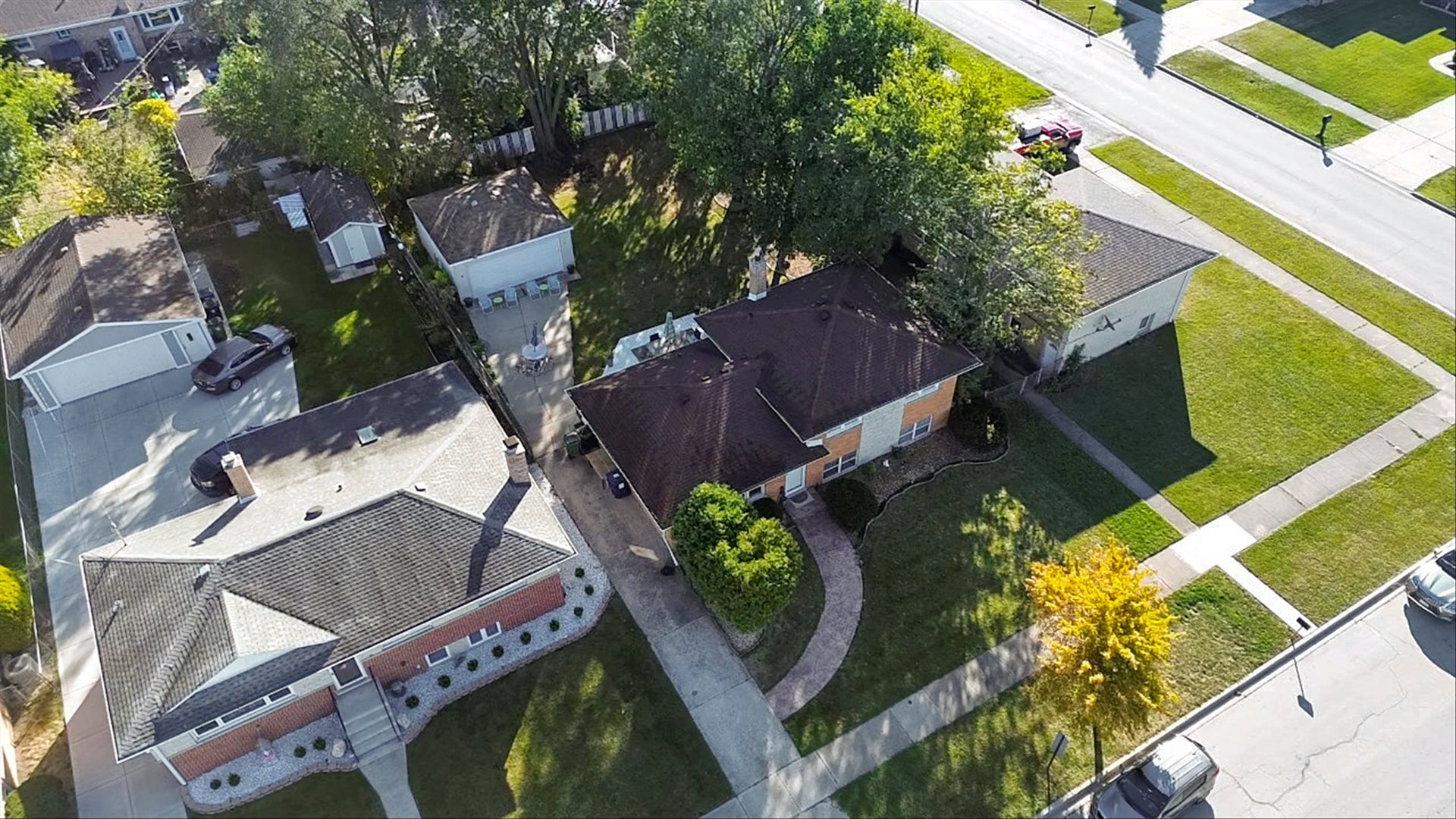 7749 South Octavia Avenue Bridgeview, IL 60455 - Photo 33 of 35 a backyard of a house with outdoor seating