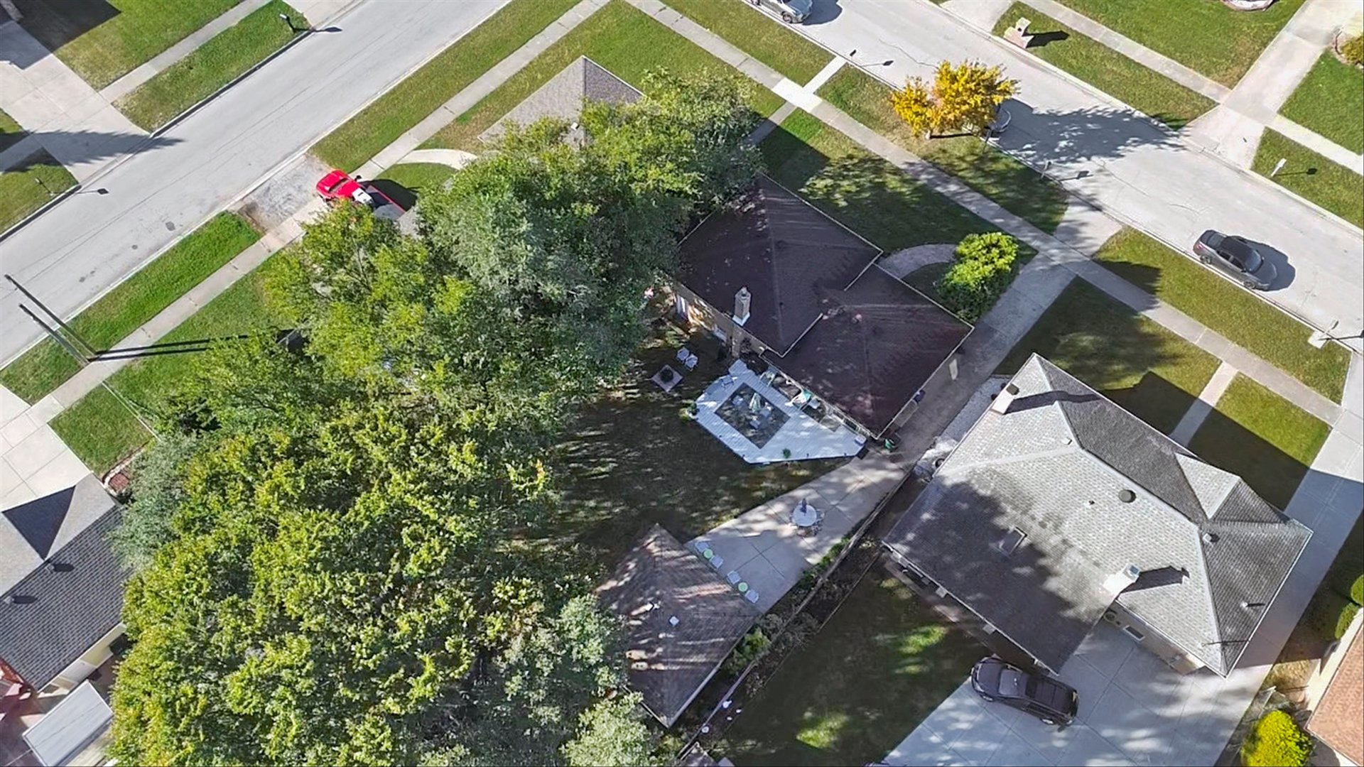 7749 South Octavia Avenue Bridgeview, IL 60455 - Photo 35 of 35 an aerial view of a house with a yard and garden
