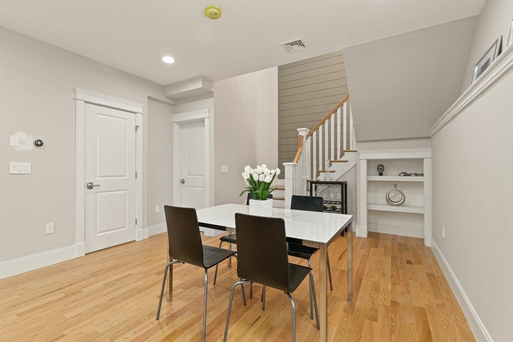 7 Whitman Street, Unit 1 Somerville, MA 02144 - Photo 16 of 35 a view of a dining room with furniture