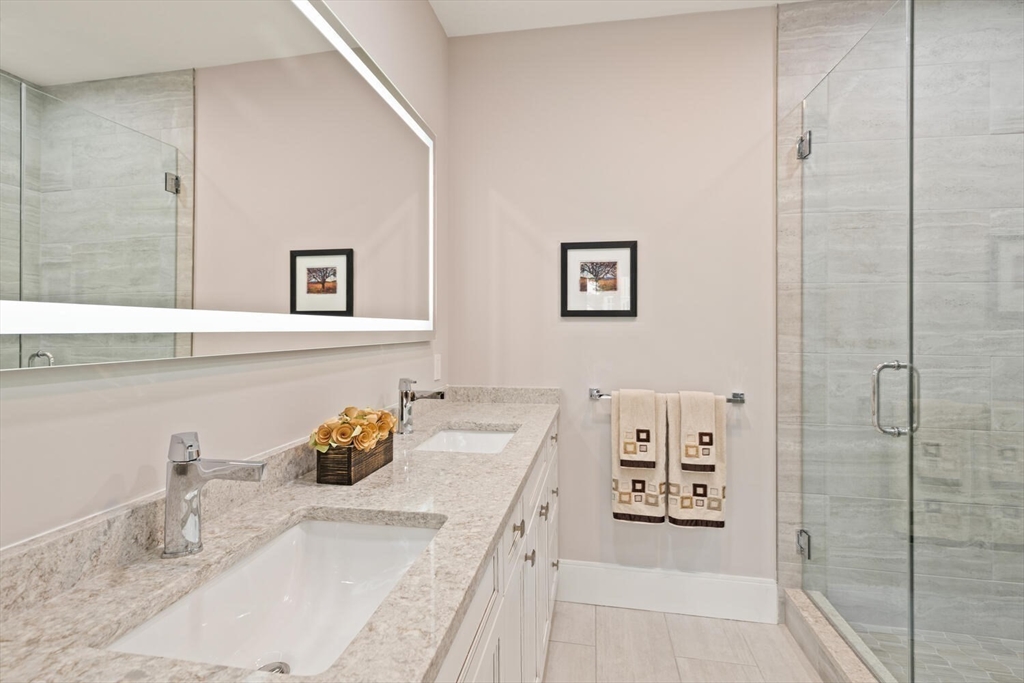 7 Whitman Street, Unit 1 Somerville, MA 02144 - Photo 24 of 35 a bathroom with a sink and a mirror