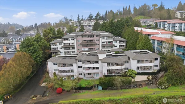 a front view of a building with garden