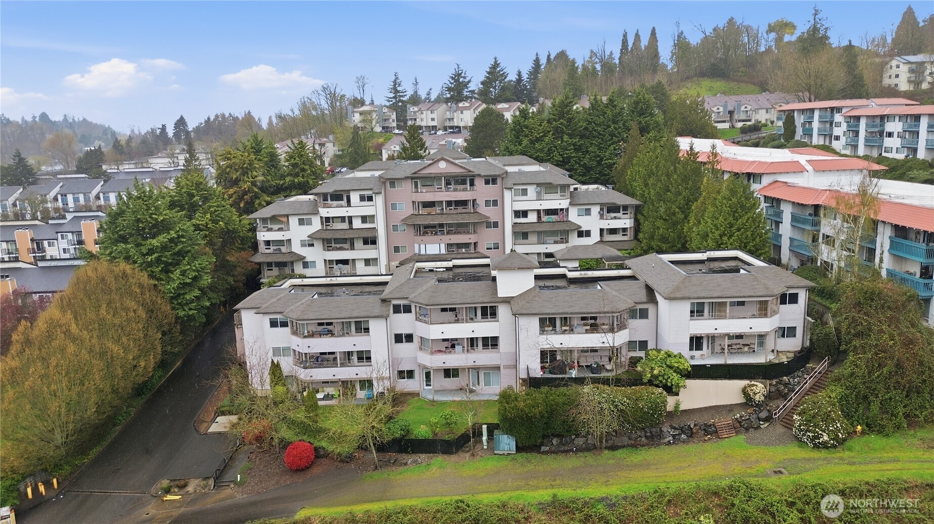 a front view of a building with garden