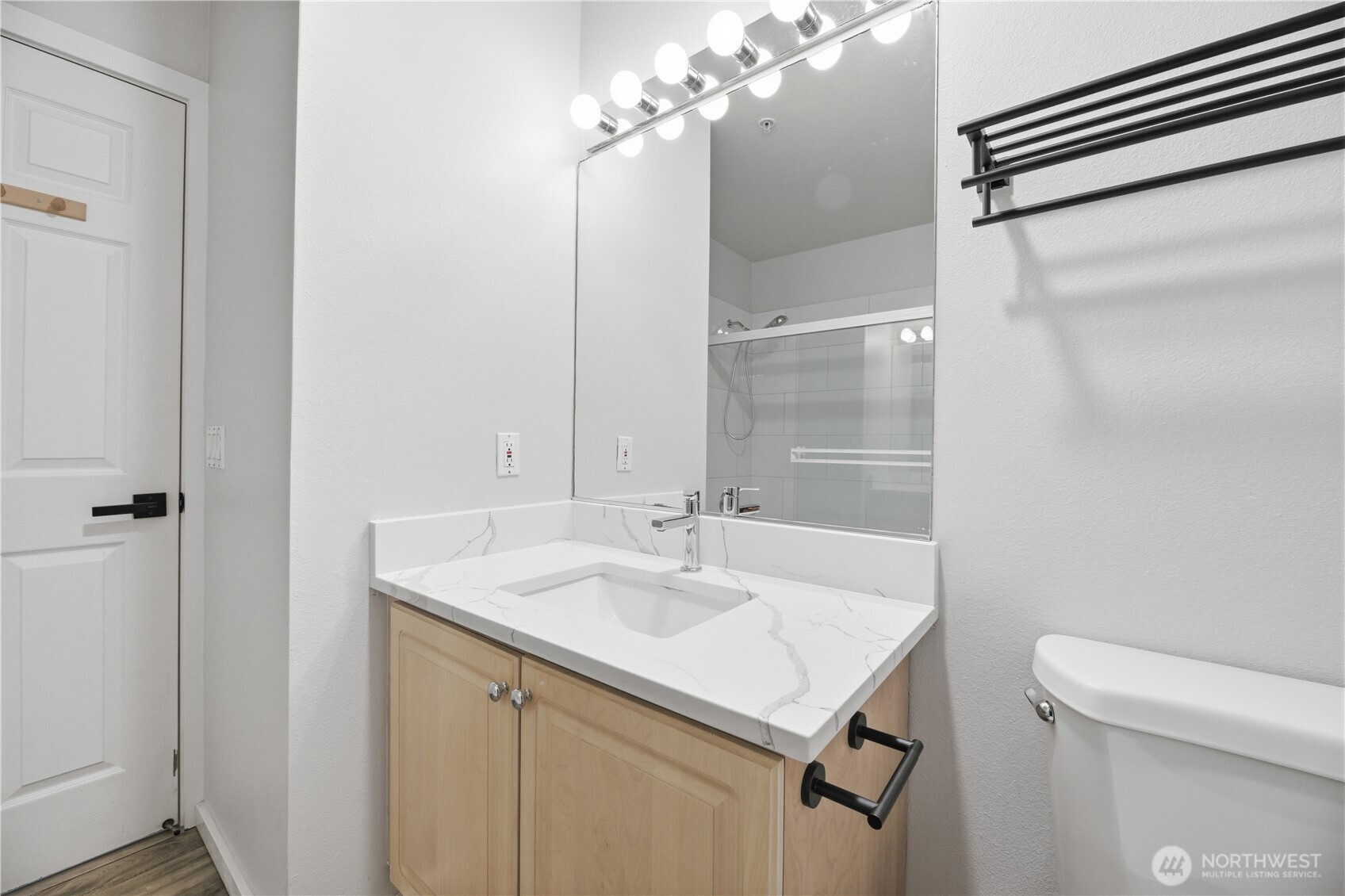 15340 Macadam Road South, Unit B206 Tukwila, WA 98188 - Photo 12 of 29 a bathroom with a sink vanity and a toilet