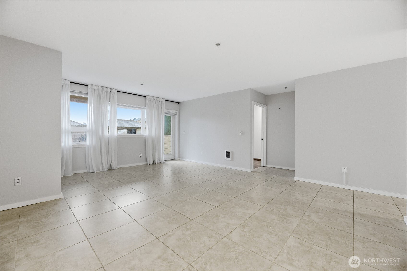 15340 Macadam Road South, Unit B206 Tukwila, WA 98188 - Photo 16 of 29 a view of an empty room and window