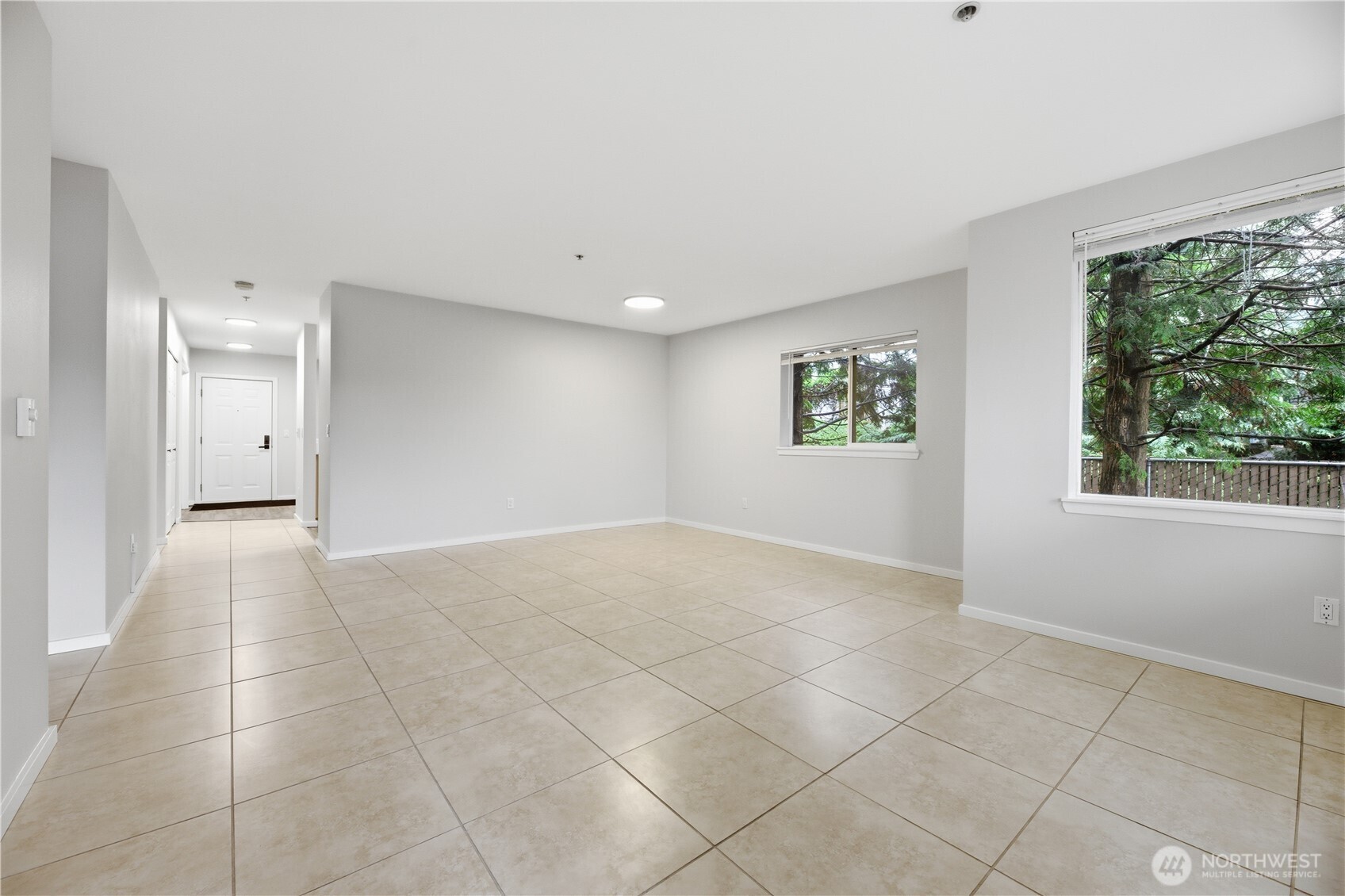 15340 Macadam Road South, Unit B206 Tukwila, WA 98188 - Photo 18 of 29 a view of an empty room with a window