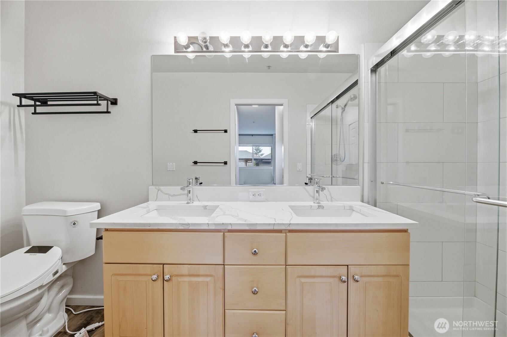 15340 Macadam Road South, Unit B206 Tukwila, WA 98188 - Photo 23 of 29 a bathroom with a sink and a mirror