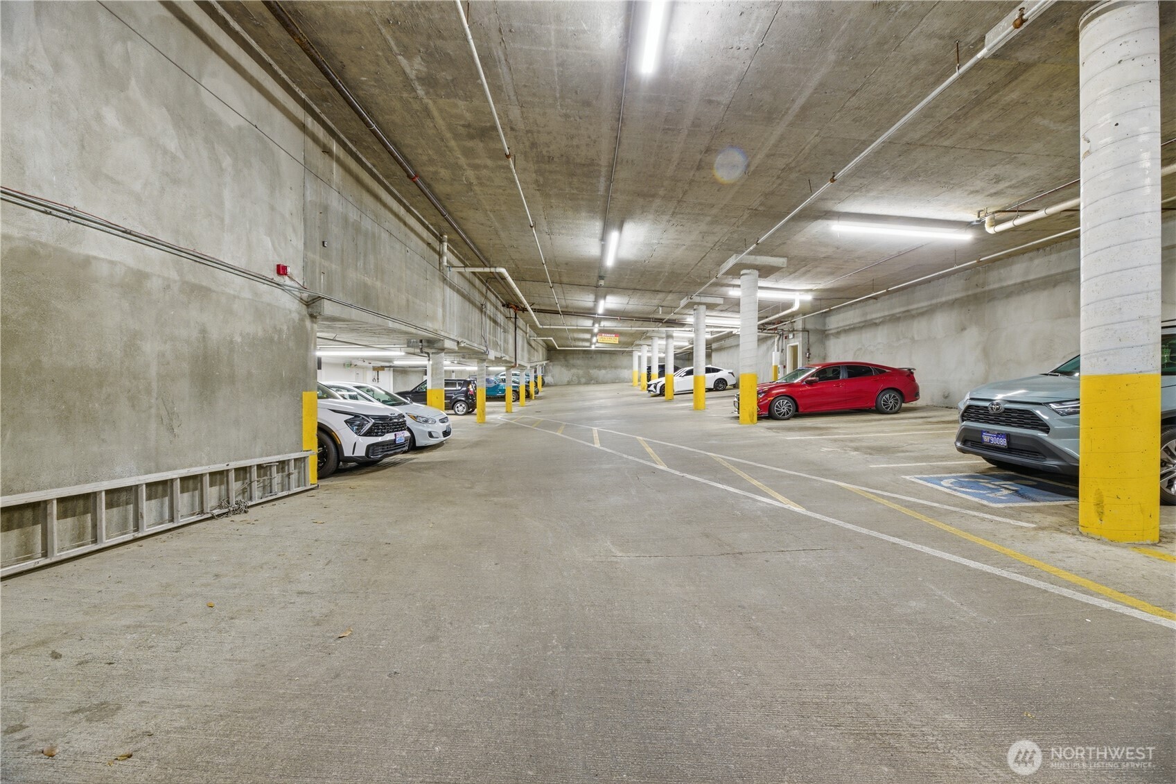 15340 Macadam Road South, Unit B206 Tukwila, WA 98188 - Photo 27 of 29 a view of parking garage with cars