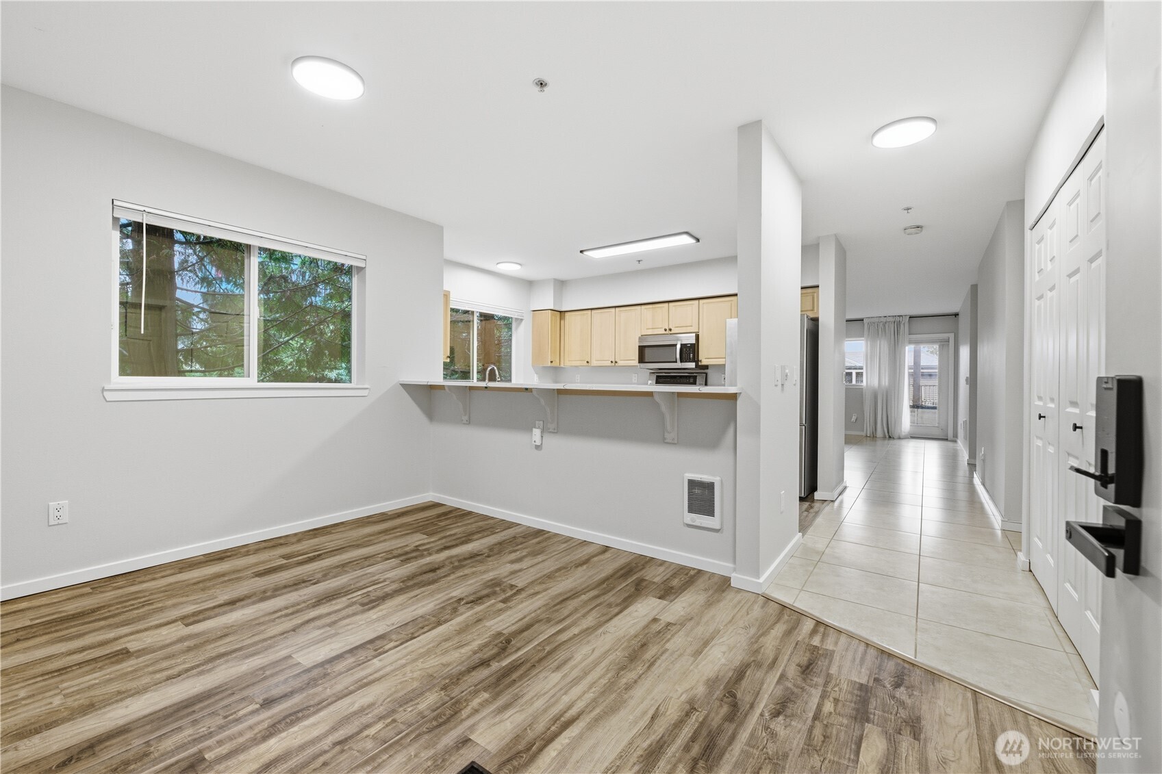 15340 Macadam Road South, Unit B206 Tukwila, WA 98188 - Photo 4 of 29 a view of a kitchen from the hallway
