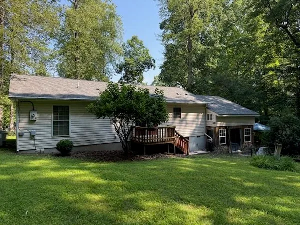 a view of a house with a garden