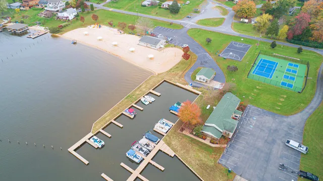 an aerial view of a house with a swimming pool
