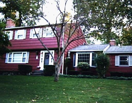 23 Deepdene Road Trumbull, CT 06611 - Photo 1 of 1 a front view of a house with a garden