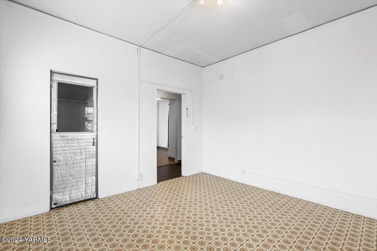 710 East Walnut Street Yakima, WA 98901 - Photo 10 of 15 a view of empty room with wooden floor
