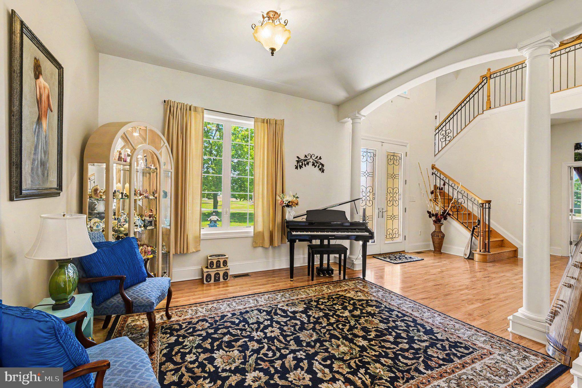627 Dr Miller Road North East, MD 21901 - Photo 8 of 77 Sitting Room & Grand Staircase #1 to Upper-Level